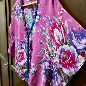 Free People top. Sheer with sequins. Good used condition. Size Small.